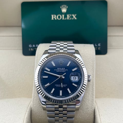 Rolex Datejust watch with blue dial and steel bracelet